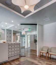 Chairs and front desk in waiting room