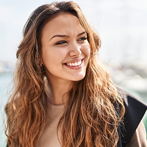 Closeup of woman smiling outside