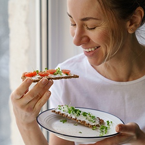 Patient enjoying healthy snack at home